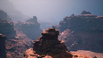 A Breathtaking Red Stone Rock Formation Emerging From the Heart of a Canyon video