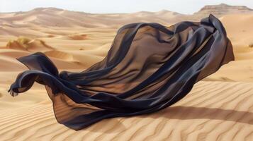 The fabric seems to be in a constant state of flux with its folds and pleats constantly shifting and rearranging with the unpredictable desert winds photo