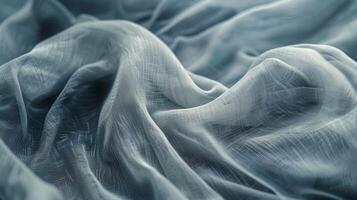 Rich textured fabrics sway and spin in a mesmerizing rhythm creating a surreal atmosphere in the peaceful valley photo