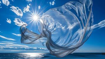 Loose ends whip and twist in the breeze as if the fabric is trying to escape the dock and soar into the sky photo