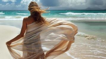 The effortless elegance of a sarong dd over a womans shoulders photo