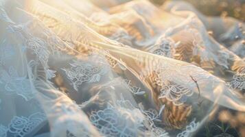 Delicate lace fabric glides through the air weaving intricate patterns as if caught in a trance photo