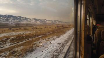 The everchanging landscape outside the panoramic windows keeps travelers in awe throughout the journey photo