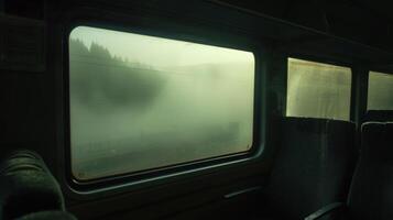 Sunlight filters through the fog creating an ethereal glow in the valley photo