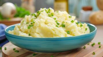 A bowl of fluffy and buttery mashed potatoes made even more delicious with a hint of avocado oil mixed in photo