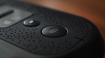 A zoomedin view of the power button on a streaming device remote with subtle grooves for easier pressing photo