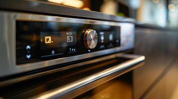 The control panel of a smart oven featuring a touch screen display with options for baking broiling and roasting as well as a builtin recipe search photo