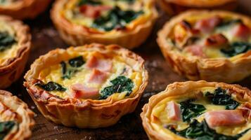 Quiches with a variety of fillings such as spinach and mushroom or ham and cheese satisfy a range of tastes photo
