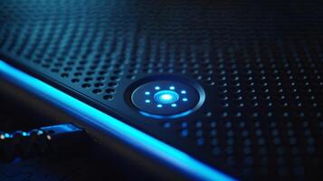 A detailed shot of a power banks power indicator a small button that lights up when pressed to display the charge level photo