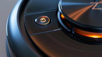 Closeup of the power button and indicator lights on a robot vacuum making it easy to operate and monitor during cleaning sessions photo