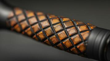 A closer look at the handle shows the intricate pattern of the leather grip providing both style and comfort for the players grip photo