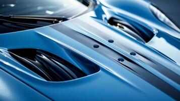 A frontal closeup of the hood of a rare sports car model highlighting its unique and aerodynamic curves and vents photo