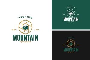 Camera lens with a mountain reflection logo design, ideal for a photography business specializing in nature and landscapes. illustration template idea vector