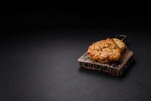 Delicious fried chicken chops with salt, spices and herbs photo
