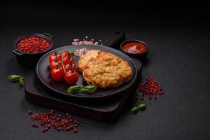 Delicious fried chicken chops with salt, spices and herbs photo