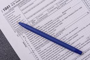 Fill out US tax form 1041 for verification and refund photo