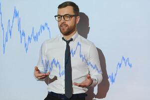 Stock Market Trader Working Investment Charts, Graphs, Ticker, Diagrams Projected on His Face. Financial Analyst and Digital Businessman Selling Shorts and Buying Longs photo