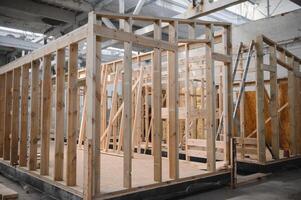 Production of new wooden modular houses. Construction site photo