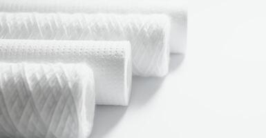filter cartridges for water on a white background. Installation of reverse osmosis water purification system. photo