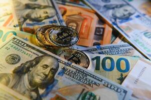 Bitcoin on background of US dollars, euro banknotes. Electronic decentralized money, exchange rate and growth of crypto currency photo