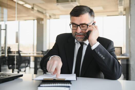 Experienced executive manager quarreling with employee on mobile yelling and screaming about bad report and failure with project, mad boss angry about software bugs in application for work photo