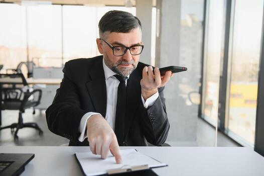 Experienced executive manager quarreling with employee on mobile yelling and screaming about bad report and failure with project, mad boss angry about software bugs in application for work photo