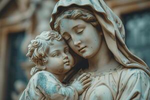 Closeup of a serene, weathered statue portraying a mother tenderly holding a child, captured with an artistic soft focus background to enhance its emotional and spiritual ambiance photo
