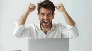 Elated Young Business Professional Celebrating Success at Work photo