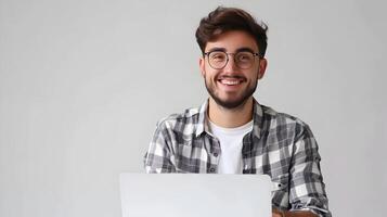 Smiling Young Professional Working on Computer in Office photo