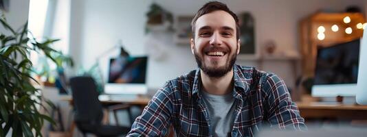 Cheerful Young Tech Professional Working Diligently in Home Office Setting photo