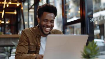 Confident Young Professional Businessman Working Intently on Laptop photo