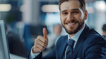 Confident Young Business Manager Showing Thumbs Up in Office photo