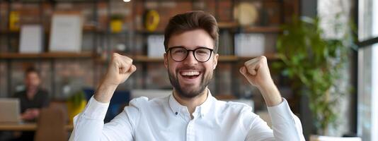 Elated Office Manager Celebrates Accomplishments in Modern Workplace Setting photo