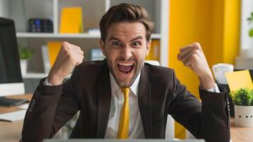 Enthusiastic Businessman Celebrating Professional Achievement in the Office photo