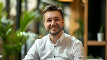 Confident Young Vice President of Smiling in Modern Office photo