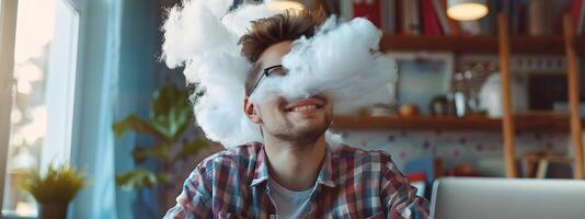 Millennial Vape Cloud Architect Relaxing and Working on Laptop in Modern Office photo
