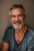 Portrait of a happy senior man with a warm smile and casual style photo