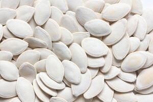Top view of pumpkin seeds pattern texture background photo