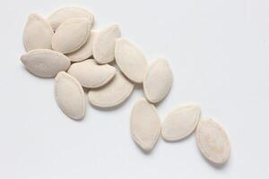 Top view of pumpkin seeds pattern texture background photo
