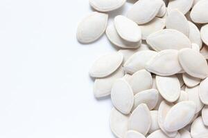 Top view of pumpkin seeds pattern texture background photo
