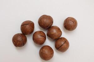 Macadamia nuts seeds background photo