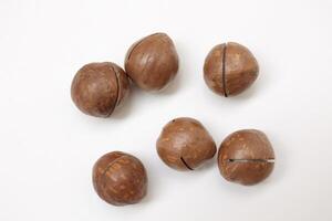 Macadamia nuts seeds background photo