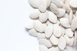 Top view of pumpkin seeds pattern texture background photo