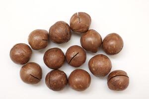 Macadamia nuts seeds background photo