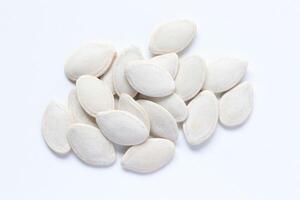 Top view of pumpkin seeds pattern texture background photo