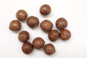 Macadamia nuts seeds background photo
