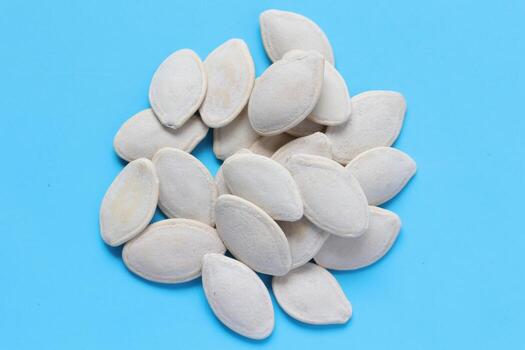 Top view of pumpkin seeds pattern texture background photo