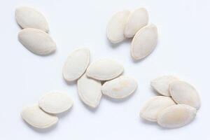 Top view of pumpkin seeds pattern texture background photo