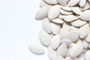 Top view of pumpkin seeds pattern texture background photo