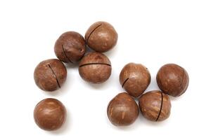 Macadamia nuts seeds background photo